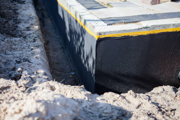 Professional Waterproofing technician working in Francis Creek, WI